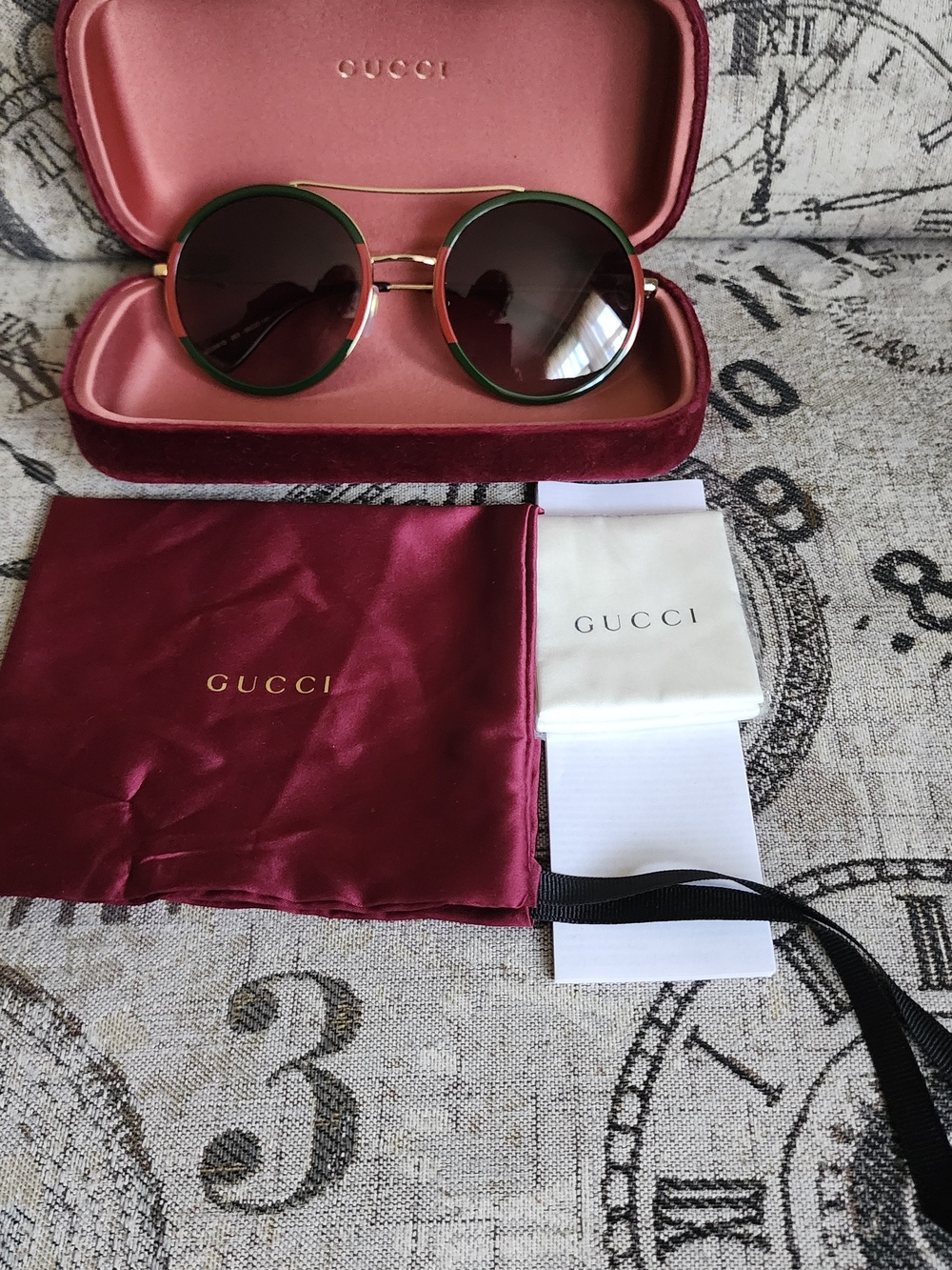 Gucci Round Gold Frame Sunglasses with Green Accents